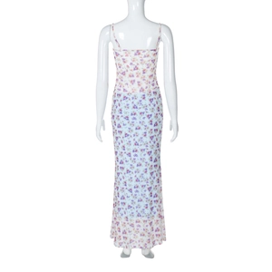 Detail view of the back of a double-layer mesh midi dress with floral patchwork patterns