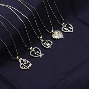 Golden heart necklaces for Mom featuring parent-child charms and sparkling crystals