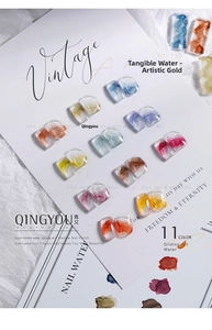 Artistic gold-flecked nail ink swatches showing 11 marble watercolor marble effects