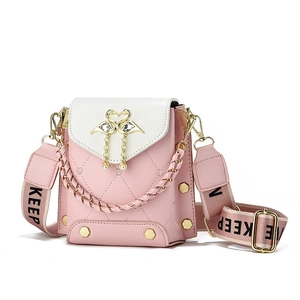 Pink and white PU crossbody bag with flamingo lock and pearl chain handle on white background