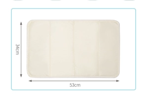 Detail view of a beige foldable changing mat for diaper bags with 53x34cm dimensions