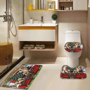 Three-piece Christmas bath mat set with cute puppies in a red truck and festive text