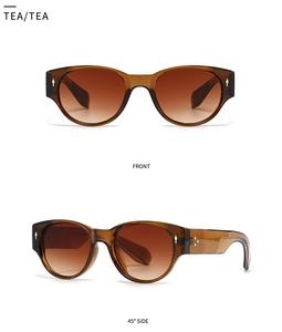 Retro round tea sunglasses with amber gradient lenses and gold rivets detail