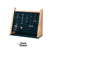 Detail of dark green velvet jewelry display stand for rings and bracelets in wood frame
