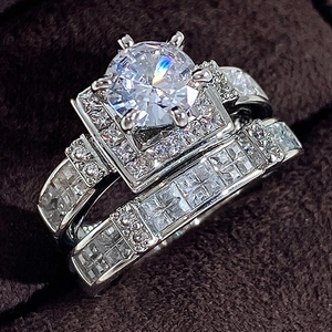Silver bridal ring set with sparkling round and square cubic zirconia in a velvet box