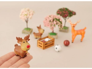 Miniature Christmas resin figurines set with deer, tiny trees and sports balls for DIY crafts