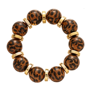 Retro leopard print acrylic beaded bracelet with metallic gold spacers on white background
