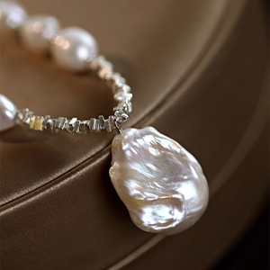 Baroque pearl pendant necklace with irregular white pearl on silver chain