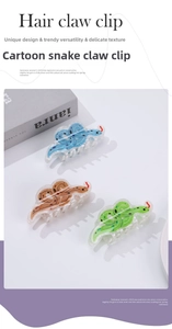Three colors of cartoon snake hair claw clips with glitter finish shown together