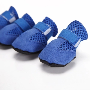 Detail of blue breathable mesh dog sports shoes with secure velcro strap and rubber sole