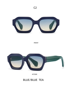 Front and side view of geometric navy blue sunglasses with green temples and gradient lenses