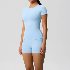 Close-up of light blue high-waist fitness shorts featuring functional side pockets