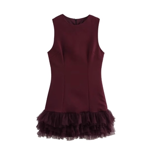 Sleeveless burgundy dress featuring stylish mesh patchwork and a pleated tiered hemline