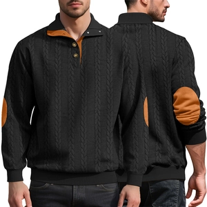 Detail of men's black knit sweatshirt with brown patchwork and stand collar buttons