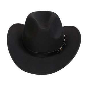Detailed shot of black wool felt cowboy hat with leather band and gold stud accents