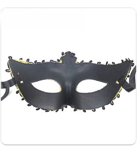 Rear view of black masquerade mask showing odorless plastic texture and ribbon ties