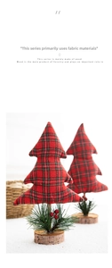 Detail of mini fabric Christmas trees with plaid patterns on natural wooden bases