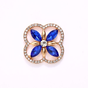 Golden clover accessory with blue faceted crystals and clear rhinestones for DIY