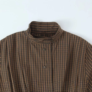Plaid cotton shirt for women featuring a stand collar and brown checkered pattern
