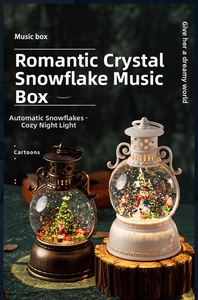 Retro Christmas lantern music box with snow globe showing snowman and tree scene with lights