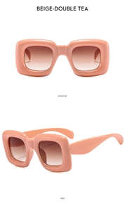 Detail view of beige square frame kids sunglasses with double tea gradient lenses