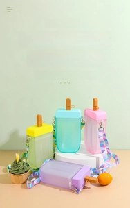 Pastel popsicle-shaped plastic water bottles with straws and adjustable straps for kids