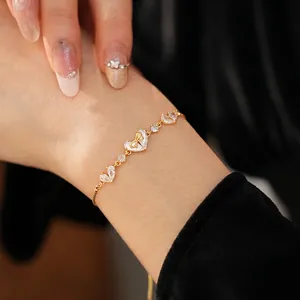 18K gold plated zircon heart bracelet with bowknot accent and adjustable bolo chain