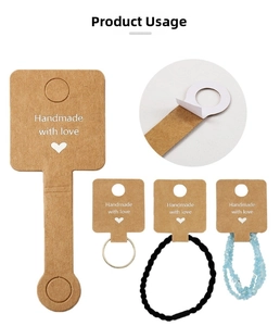 Detail showing self-adhesive kraft paper jewelry display cards with handmade heart logo