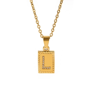 Detail of 18k gold plated square pendant featuring a zircon encrusted L letter design