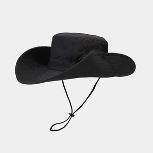 Detail of black quick-dry sun hat showing breathable metal eyelets and adjustable wind cord