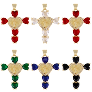 Gold cross necklace pendants with colorful heart-shaped gems and embossed center
