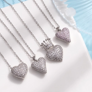 Sparkling heart and crown pendant necklace with micro-paved cubic zirconia crystals