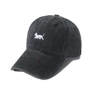 Vintage washed baseball cap in charcoal black with white dog embroidery and curved brim