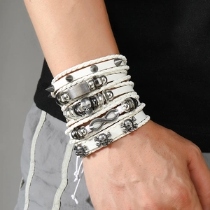 Men's punk leather bracelet set with skull charms and infinity symbols on wrist