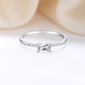 S925 sterling silver ring featuring a rectangular clear crystal and pave diamond accents
