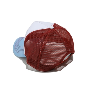 Detailed back view of a retro trucker hat featuring red mesh and blue stitched brim