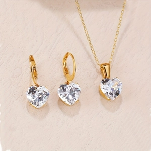 Detailed view of heart-shaped zircon jewelry set with gold-plated necklace and earrings