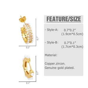 Detail view of 18K gold plated C-shaped earrings with pearls and zircon stones