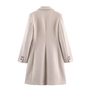 Back view of slim fit oatmeal wool coat showing neat stitching and cuff button details