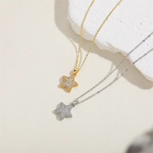 Star zircon pendant necklace in gold and silver finish with pavé stones for women