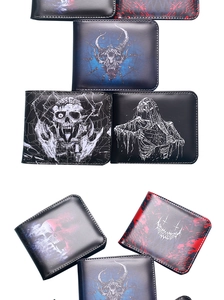 Detailed view of men's gothic wallets featuring skull prints on black faux leather