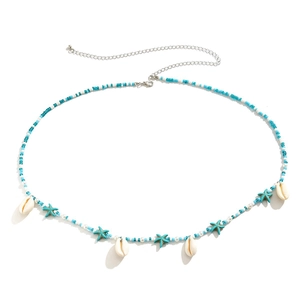 Bohemian blue and white beaded waist chain with starfish and shell charms for beach wear