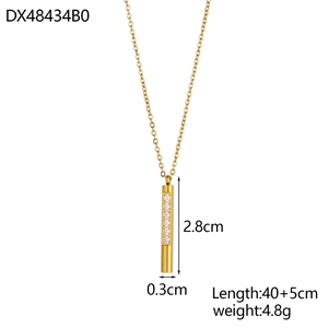 Minimalist gold bar pendant necklace in titanium steel with clear stones on white background