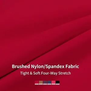 Ensemble de yoga rouge en nylon extensible quatre sens pour fitness et course à pied