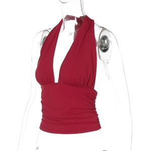 Detailed view of red halter neck camisole with pleated waist design on mannequin