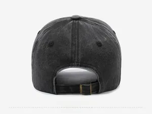 Detail of washed vintage baseball cap back with adjustable bronze metal buckle