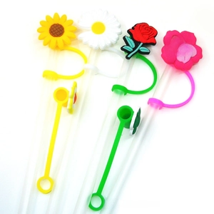 Set of four floral silicone straw covers featuring sunflower and daisy designs