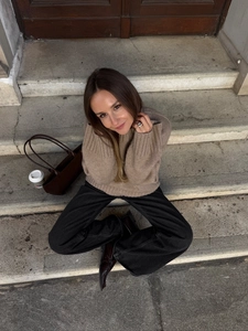Chic autumn style featuring camel knit sweater with black trousers and brown leather tote bag