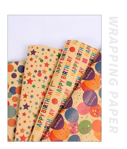 Detail of kraft birthday wrapping paper with stars balloons and happy birthday patterns