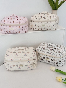 Quilted cotton cartoon cosmetic storage bags in pink and beige with cute animal patterns
